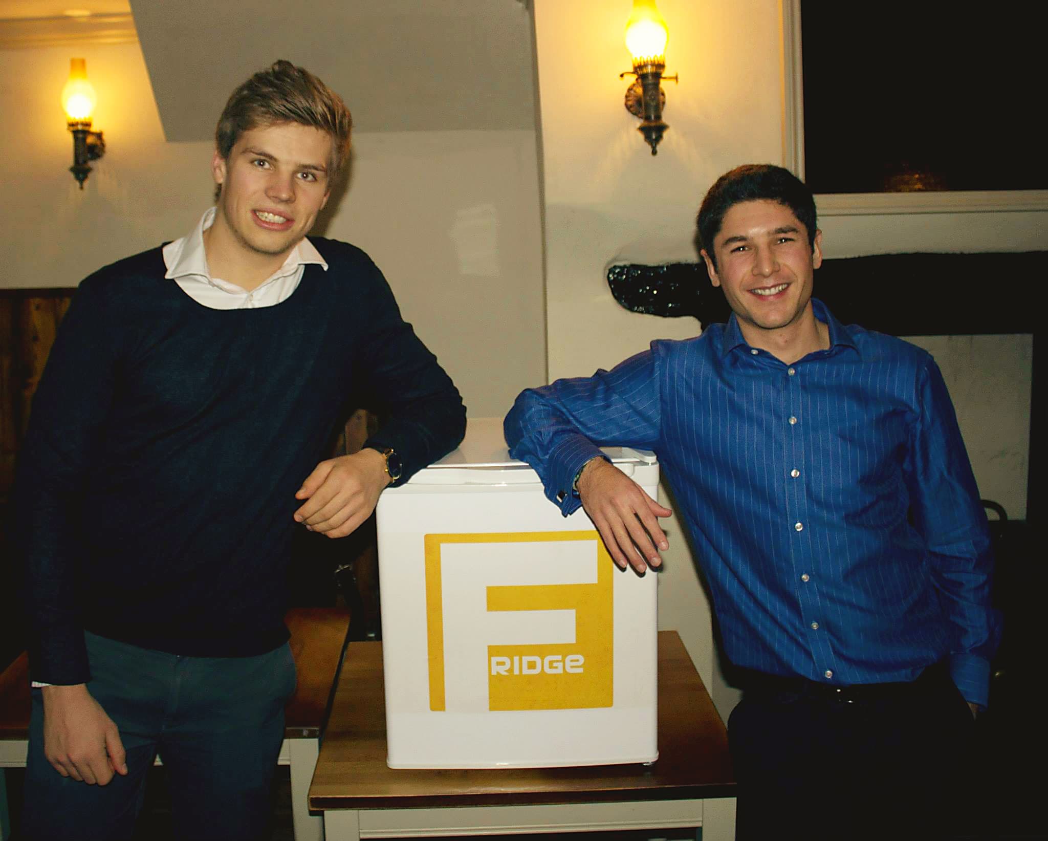 Will (left) and Henry Reith (right) with the fridge, 2013